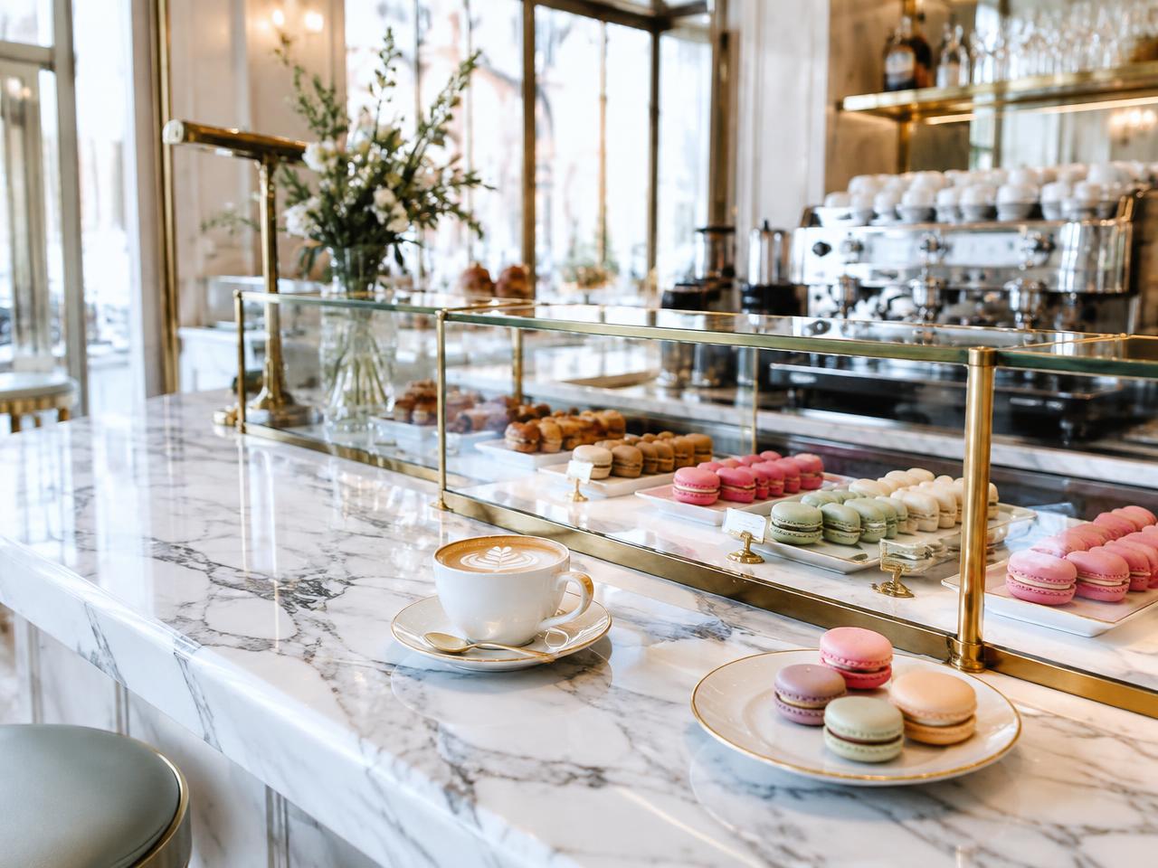Croffee & Co. — Flat whites and macarons on marble